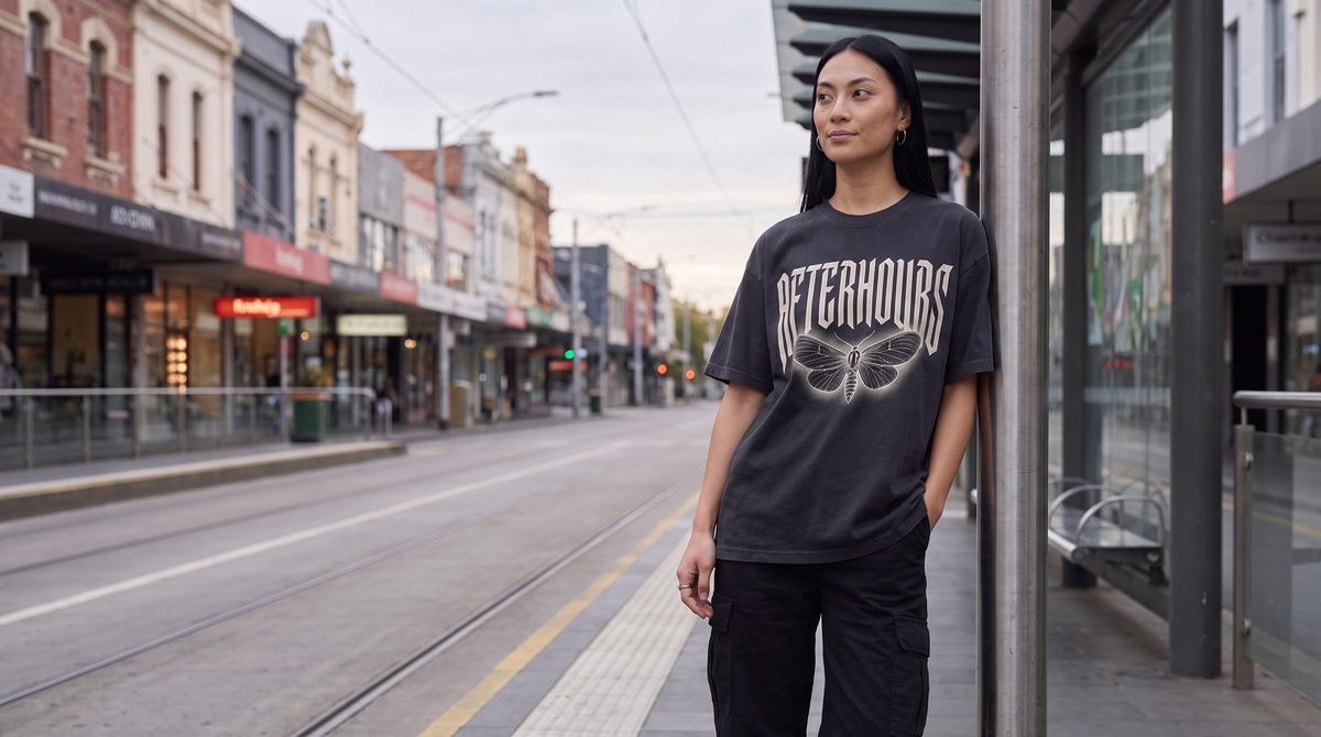 Coralyn - Afterhours oversized t-shirt at a Melbourne tram stop